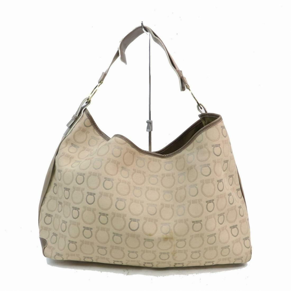 Authentic FERRAGAMO Canvas Shoulder Bag: Brand: FERRAGAMO Material: Canvas Style: Shoulder Bag Color: Beiges Size(inch): W19.6 inch(approx) /50 cm(approx) x H11.8 inch(approx) /30 cm(approx) x D5.11 inch(approx) /13 cm(approx) " / Strap Drop