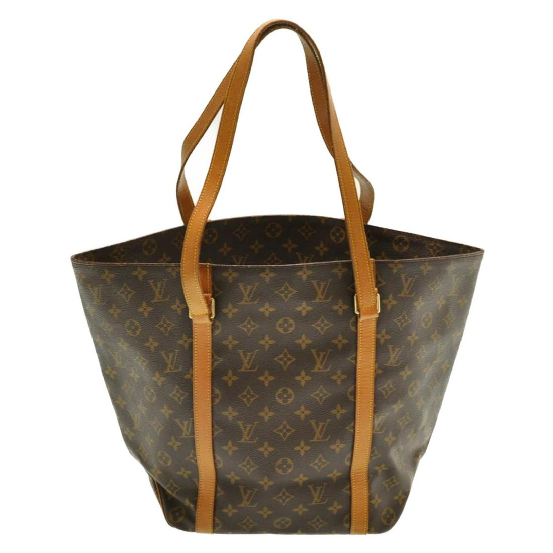 Authentic Louis Vuitton Monogram Sac Shopping Tote Bag: Brand: Louis Vuitton Style: Tote Bag Material: Monogram Canvas Color: Monogram Size (Inches): W9.8-19.6 X H13 X D5.5" / Shoulder Strap Drop 12.2"(Approx) Exterior Condition: Monogram Canvas : Minor Ru
