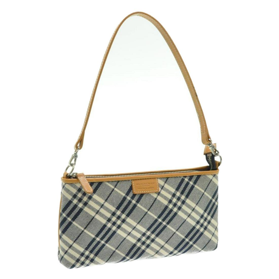 Authentic Burberry Blue Label Nova Check Hand Pouch: Brand: Burberry Style: Pouch Material: Canvas Color: Blue Size (Inches): W9.84 X H5.11 X D1.18Inch(Approx) Exterior Condition: Canvas : Minor Rubbing Handle : Minor Stain Metal Fitting : Minor Scratch