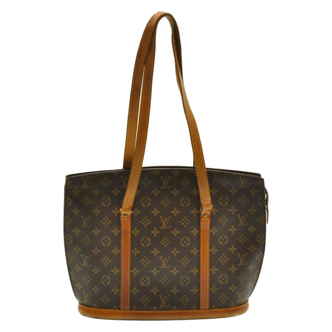 Authentic Louis Vuitton Monogram Babylone Tote Bag: Brand: Louis Vuitton Style: Tote Bag Material: Monogram Canvas Color: Monogram Size (Inches): W15.7 X H11.8 X D4.3"(Approx) Exterior Condition: Monogram Canvas : Minor Loose Shape, Rubbing Leather : S