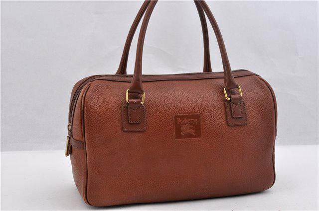 Authentic BURBERRY Leather Hand Bag: Brand: BURBERRY Material: Leather Style: Hand Bag Color: Brown Size(inch): W11.8 x H7.9 x D4.5" / Handle Drop 5.1"(Approx) Country of Origin: - Accessory: There is no ItemBox and DustBag.We will send