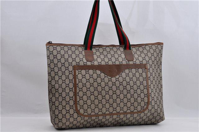 Authentic GUCCI Tote Bag: Brand: GUCCI Material: PVC Style: Tote Bag Color: Brown Size(inch): W19.7 x H12.6 x D3.9" / Handle Drop 9.4"(Approx) Country of Origin: Italy Accessory: There is no ItemBox and DustBag.We will send on