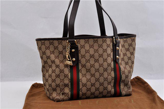 Authentic GUCCI Tote Bag: Brand: GUCCI Material: Canvas Style: Tote Bag Color: Brown Size(inch): W15.4 x H9.1 x D5.3"/ Strap Drop 8.9"(Approx) Country of Origin: Italy Accessory: DustBag All Bidhaus items come with a 100% mone