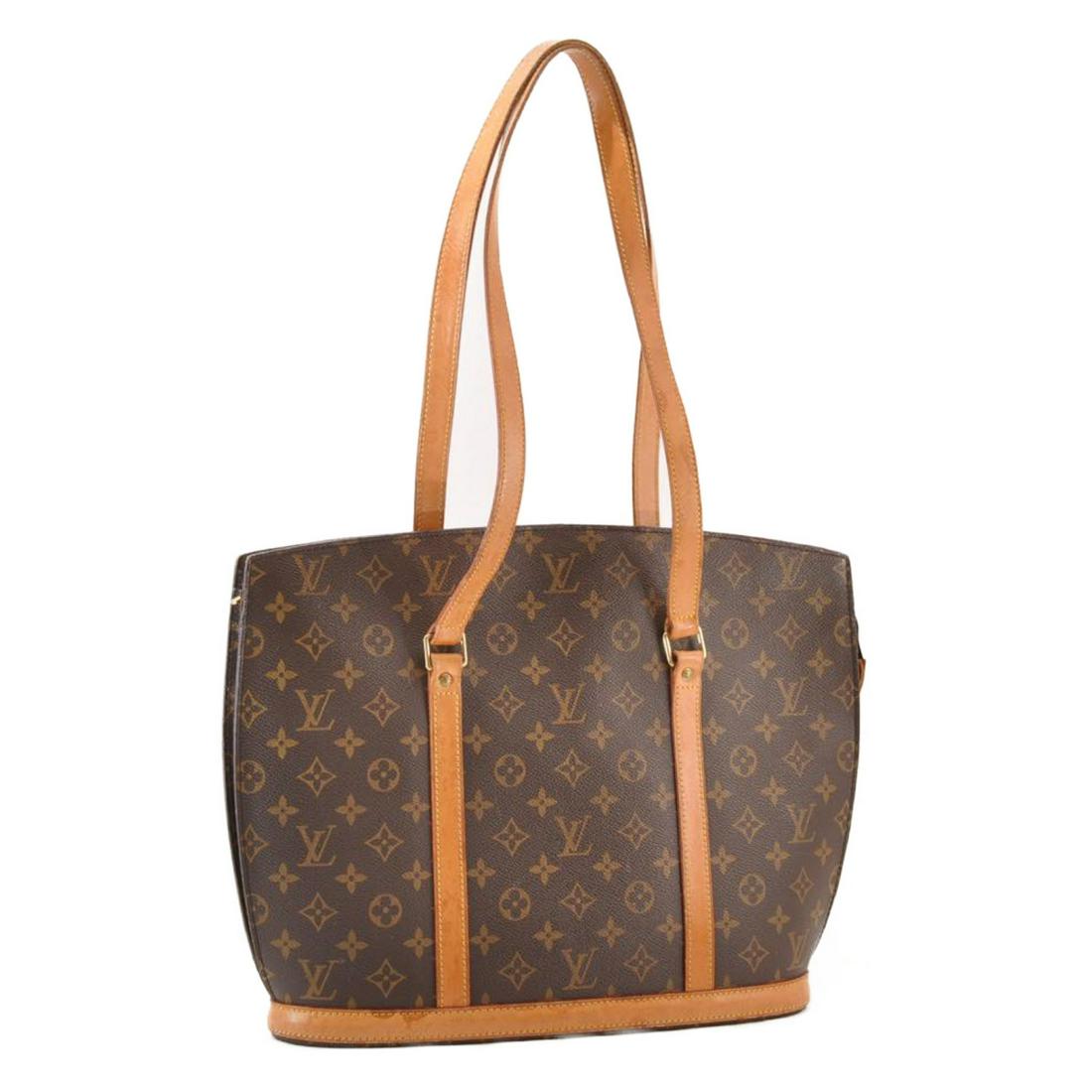 Authentic LOUIS VUITTON Babylone: Brand: LOUIS VUITTON Material: Monogram Canvas Style: Tote Bag Color: Monogram Size(inch): W15.7 x H11.8 x D4.3â€³(Approx) Country of Origin: France Accessory: There is no item box and dust bag. W