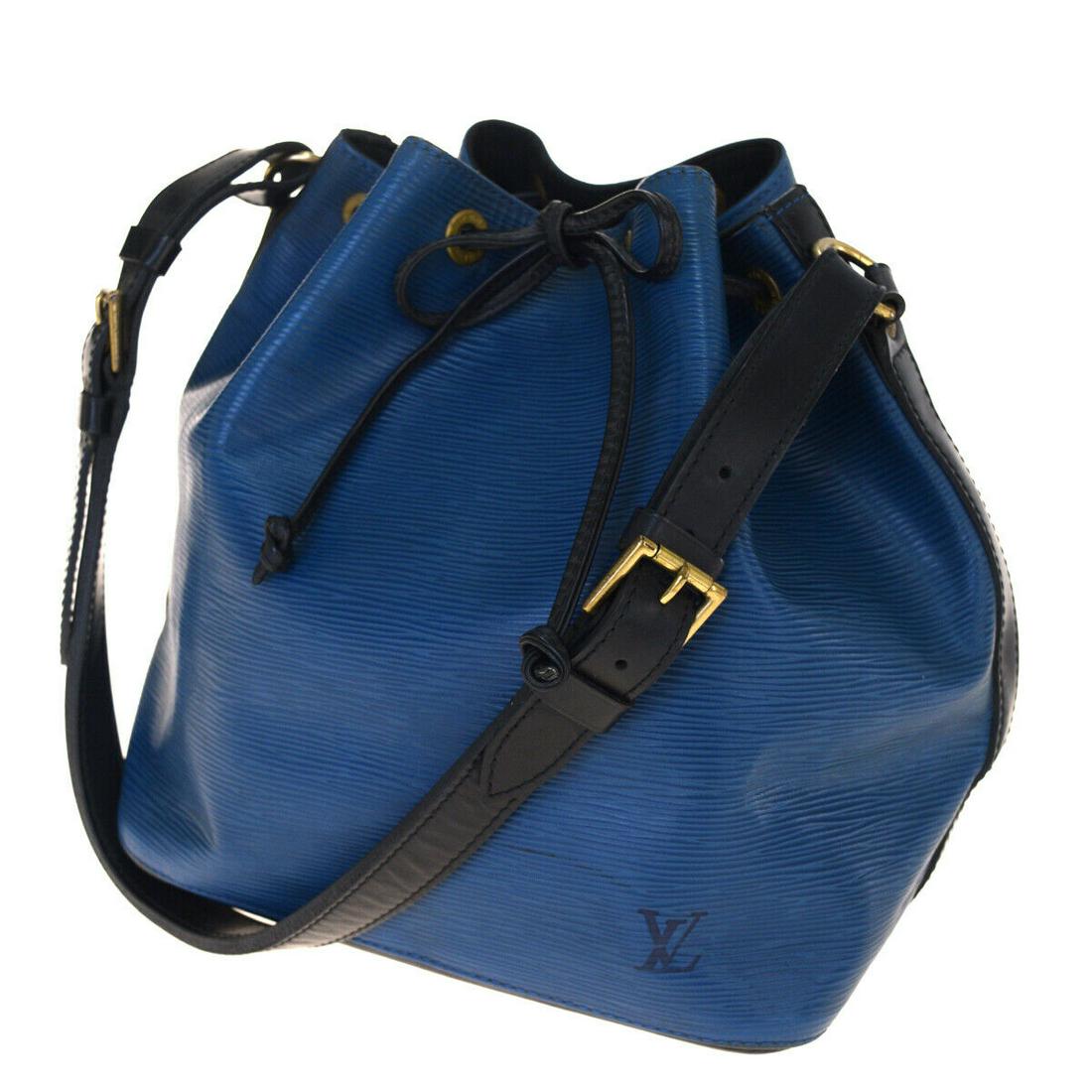 Authentic LOUIS VUITTON Noe Pm: Brand: LOUIS VUITTON Material: Epi Leather Style: Shoulder bag Color: Blue Black Size(inch): W 9.8 x H 10.6 x D 7.1 "(approx.) Country of Origin: France Come with: - All Bidhaus items come with a 100%