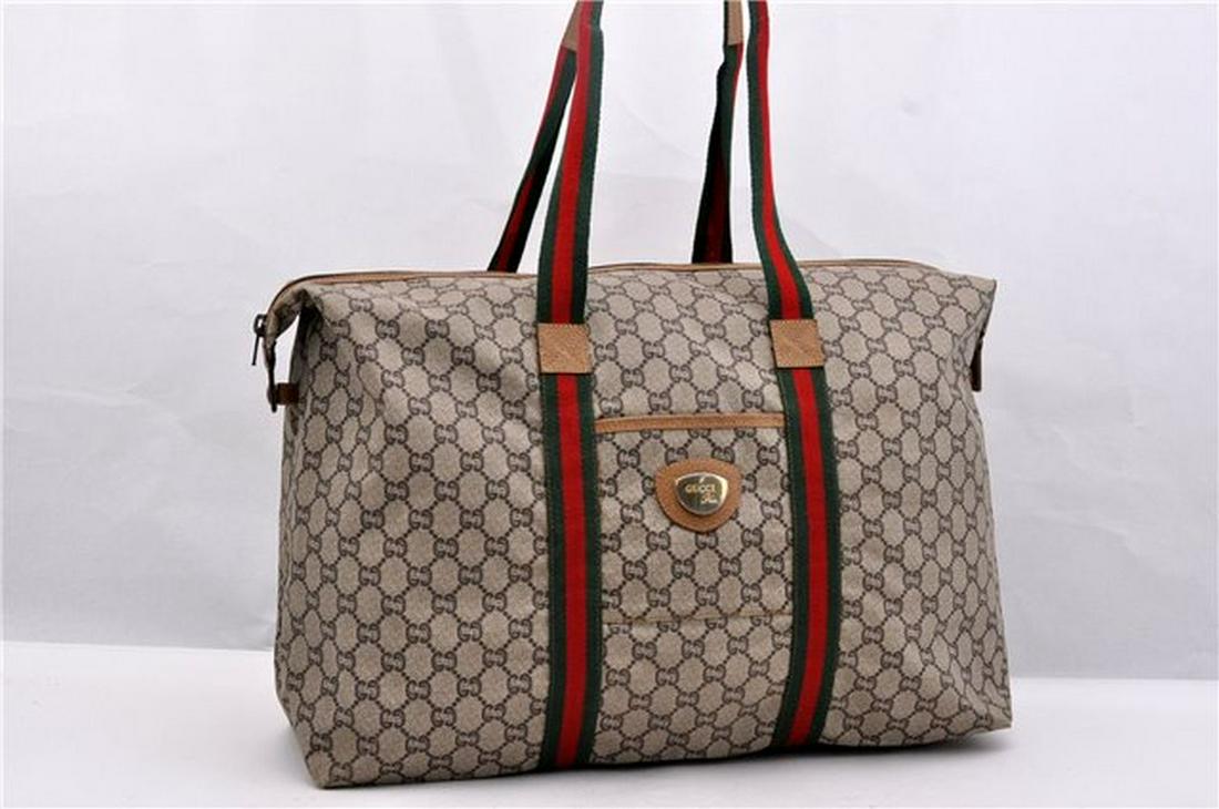 Authentic GUCCI Tote Bag: Brand: GUCCI Material: PVC Style: Tote Bag Color: Brown Size(inch): W17.3 x H12.6 x D5.9" / Handle Drop 7.9"(Approx) Country of Origin: Italy Accessory: There is no ItemBox and DustBag.We will send on