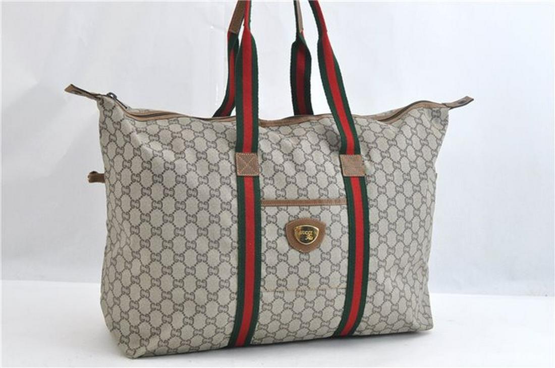 Authentic GUCCI Tote Bag: Brand: GUCCI Material: PVC Style: Tote Bag Color: Brown Size(inch): W22 x H0.1 x D6.3" / Handle Drop 7.1"(Approx) Country of Origin: Italy Accessory: There is no ItemBox and DustBag.We will send only 