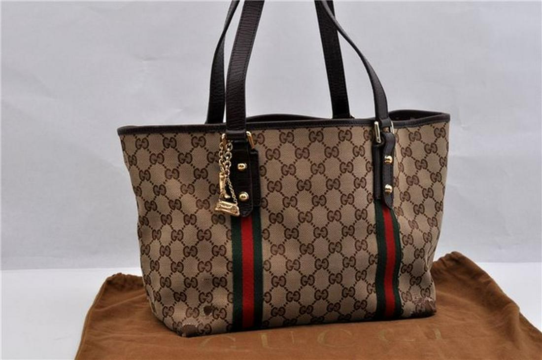 Authentic GUCCI Tote Bag: Brand: GUCCI Material: Canvas Style: Tote Bag Color: Brown Size(inch): W15.4 x H9.1 x D5.3"/ Strap Drop 8.9"(Approx) Country of Origin: Italy Accessory: DustBag All Bidhaus items come with a 100% mone