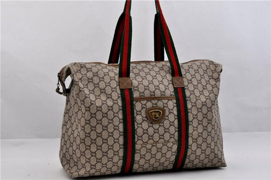 Authentic GUCCI Tote Bag: Brand: GUCCI Material: PVC Style: Tote Bag Color: Brown Size(inch): W17.1 x H13.4 x D5.9" / Handle Drop 7.9"(Approx) Country of Origin: Italy Accessory: There is no ItemBox and DustBag.We will send on