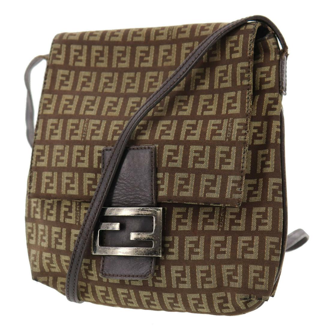 Authentic FENDI Vintage: Brand: FENDI Material: Nylon CANVAS Leather Style: Shoulder Bag Color: Brown Size(Inch): H 8.2 x D 1.5 x L 9.0 Shoulder : 49.6 - 51.9 Country of Origin: Italy Come with: - All Bidhaus items come with 