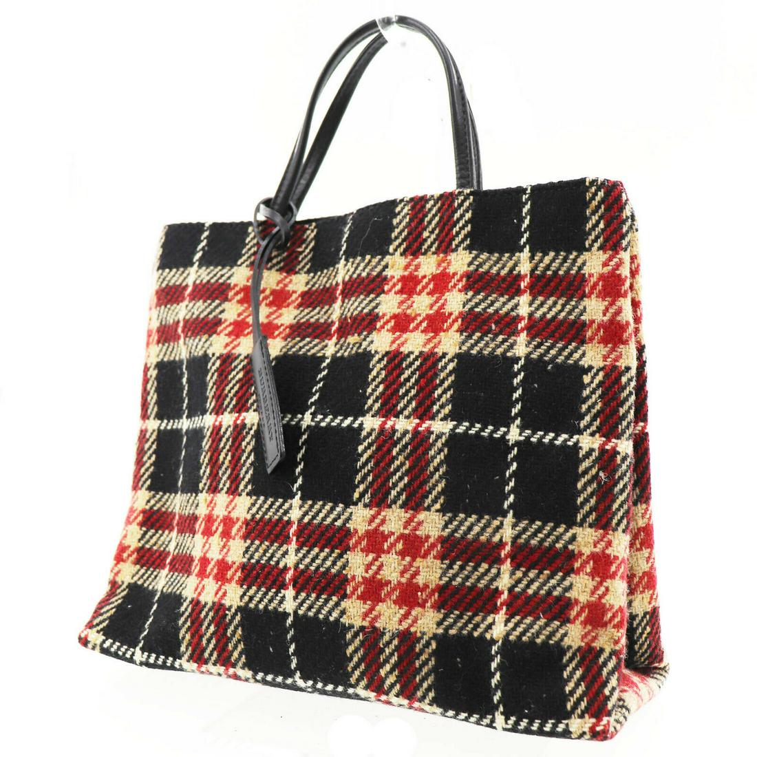 Authentic BURBERRY Wool Leather Hand Bag: Brand: BURBERRY Material: Wool Leather Style: Hand Bag Color: Black Red Size(Inch): H 9.4 x D 4.3 x L 11.4 Handle. 10.2 Come with: - All Bidhaus items come with a 100% money-back authenticity guarante