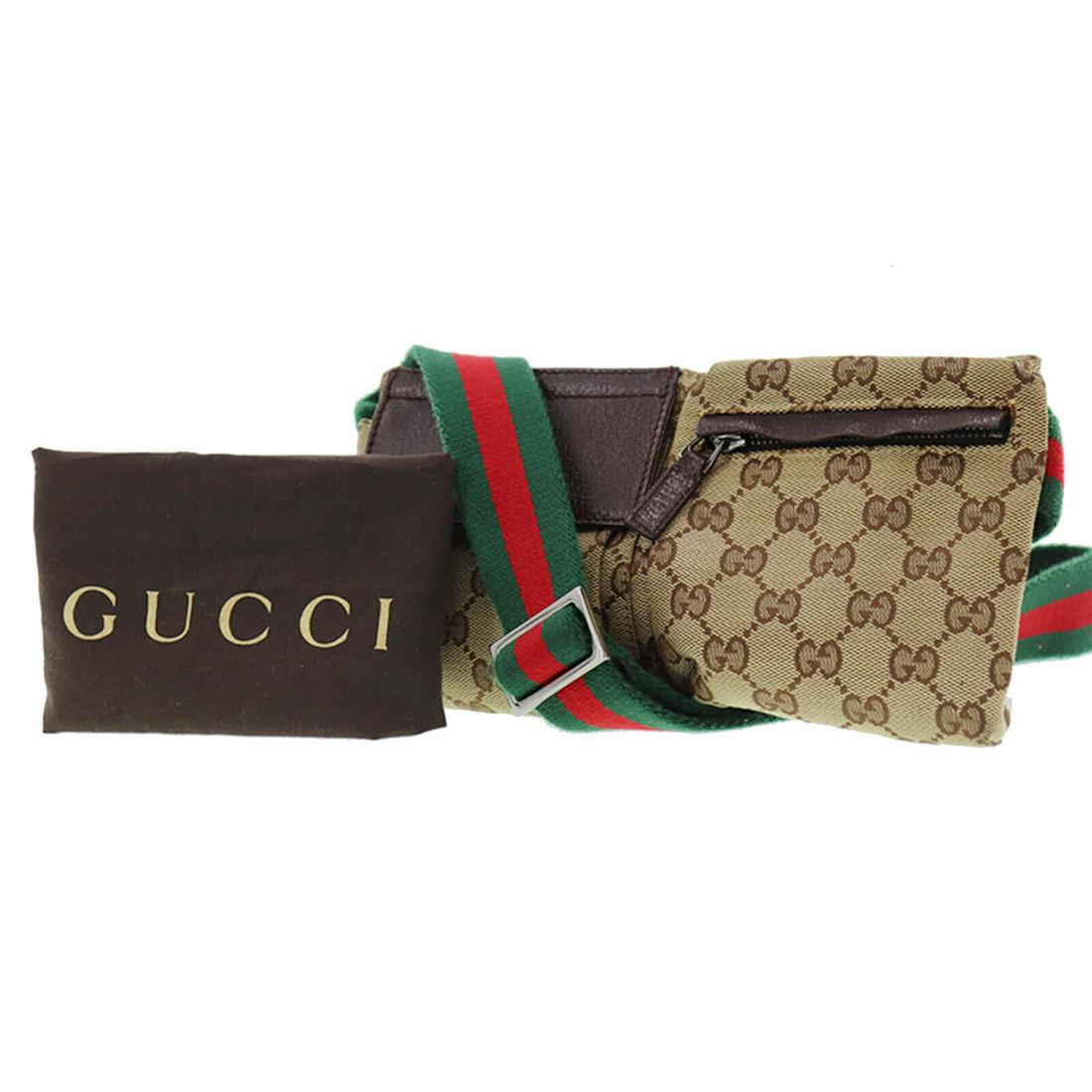 Authentic GUCCI Canvas Leather Fanny Pack: Brand: GUCCI Material: Canvas Leather Style: Fanny pack Color: Brown, Green, Red Size(Inch): H 4.9 x D 0.7x L 9.0 Belt.22.0-37.7 Country of Origin: Italy Come with: Dust Bag All Bidhaus items come wit
