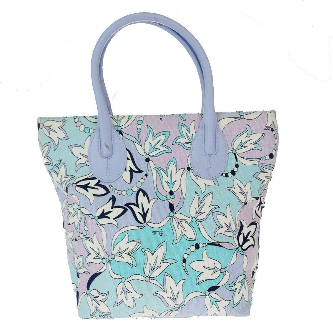 Authentic EMILIO PUCCI Canvas, Leather Hand Bag: Brand: EMILIO PUCCI Material: Canvas, Leather Style: Hand Bag Color: Purple Size(inch): W 7.9 x H 9.4 x D 4.3 "(approx.) Country of Origin: China Come with: - All Bidhaus items come with a 100% money-
