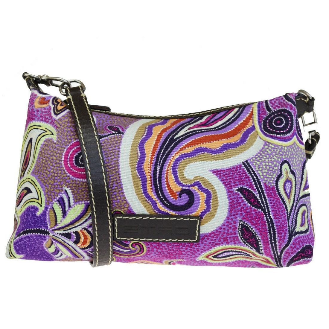 Authentic ETRO Canvas, Leather Shoulder Bag: Brand: ETRO Material: Canvas, Leather Style: Shoulder Bag Color: Purple Size(inch): W 9.8 x H 6.3 x D 3.1 "(approx.) Country of Origin: 16092-4197 01-04-05 Come with: - All Bidhaus items come with a 1