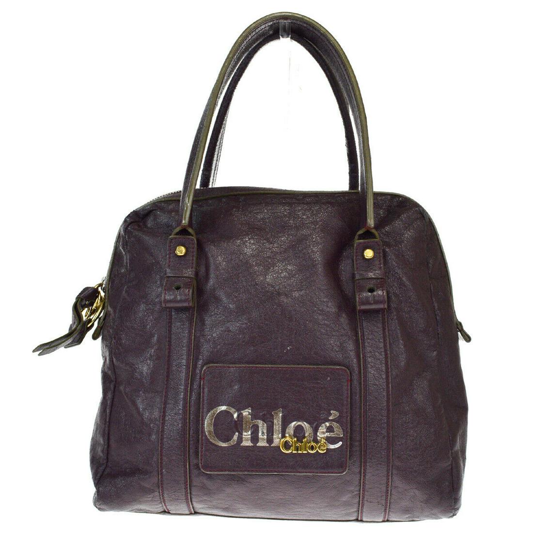 Authentic CHLOE Leather Shoulder Bag: Brand: CHLOE Material: Leather Style: Shoulder Bag Color: Purple Size(inch): W 12.6 x H 12.6 x D 5.1 "(approx.) Country of Origin: Romania Come with: - All Bidhaus items come with a 100% money-back au