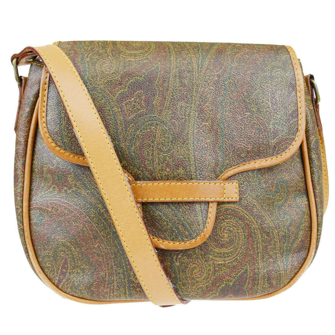 Authentic Etro PVC, Leather Shoulder bag: Brand: Etro Material: PVC, Leather Style: Shoulder bag Color: Brown Size (HxWxD): 20cm x 22.5cm x 8cm / 7.87'' x 8.85'' x 3.14'' Country of Origin: Italy All Bidhaus items come with a 100% money-back 