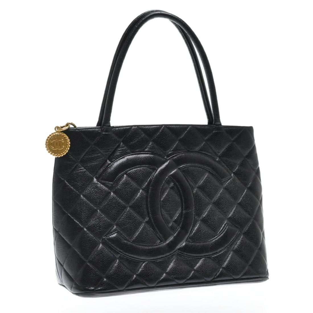 Authentic Chanel Caviar Skin Leather Matelasse Tote: Brand: Chanel Style: Tote Bag Material: Caviar Skin Leather Color: Black Made In: - Size (Inches): W11.81 X H9.05 X D5.51Inch(Approx) Exterior Condition: Caviar Skin Leather : minor Rubbing Handle : m