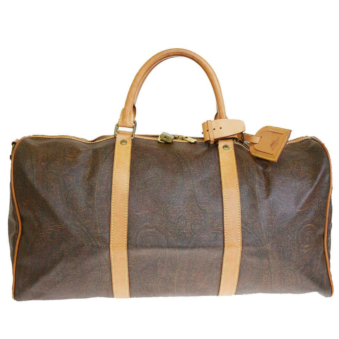 Authentic ETRO PVC Leather Hand Bag: Brand: ETRO Material: PVC Leather Style: Hand Bag Color: Bordeaux, Size(inch): W 19.3 x H 9.8 x D 9.4"(approx.) Country of Origin: Italy Come with: Name tag,Padlock,Key*2,Keybell,Handle holder All Bid