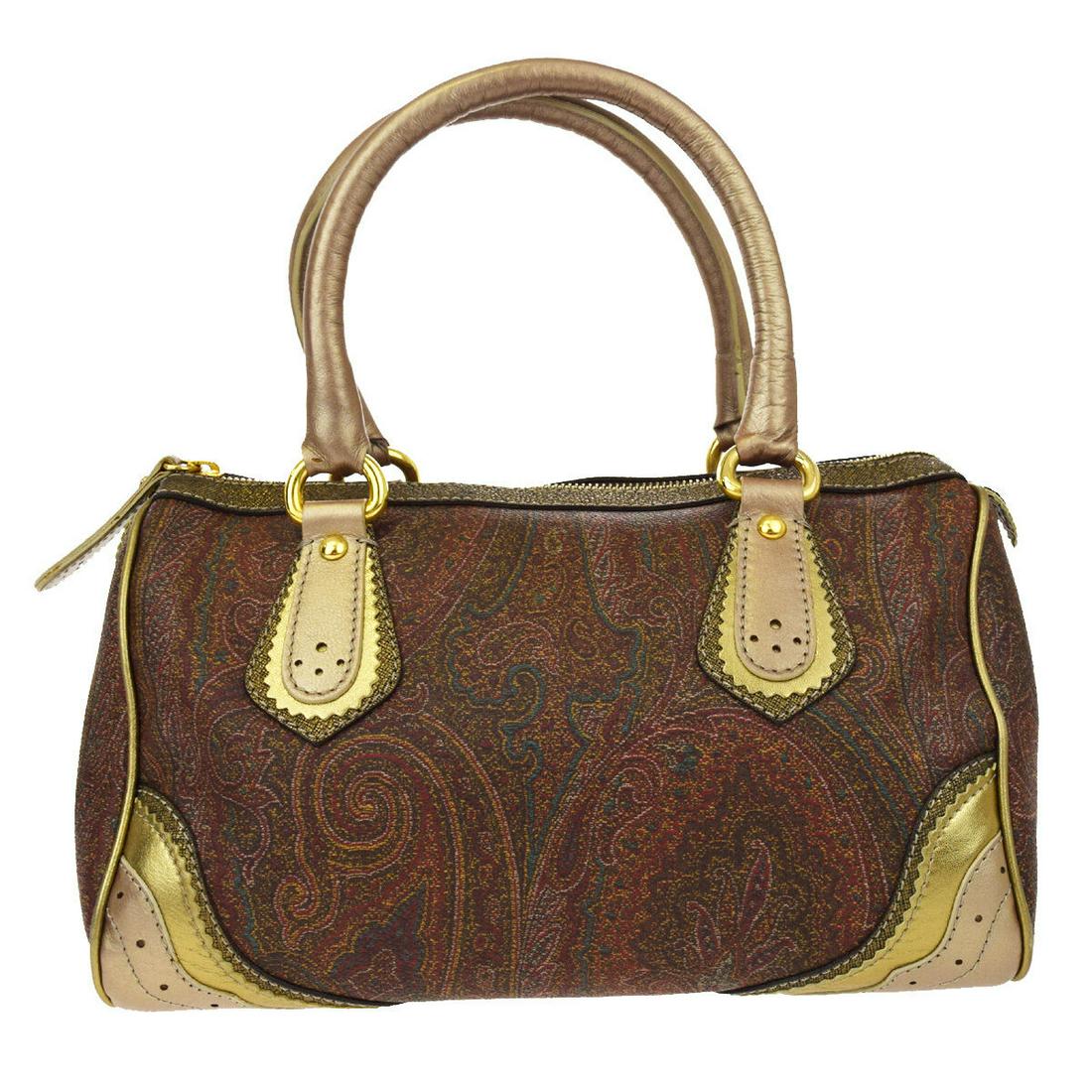 Authentic ETRO PVC Leather Hand Bag: Brand: ETRO Material: PVC Leather Style: Hand Bag Color: Bordeaux,Gold Size(inch): W 11 x H 6.3 x D 6.3 "(approx.) Country of Origin: Italy Come with: - All Bidhaus items come with a 100% money-back a