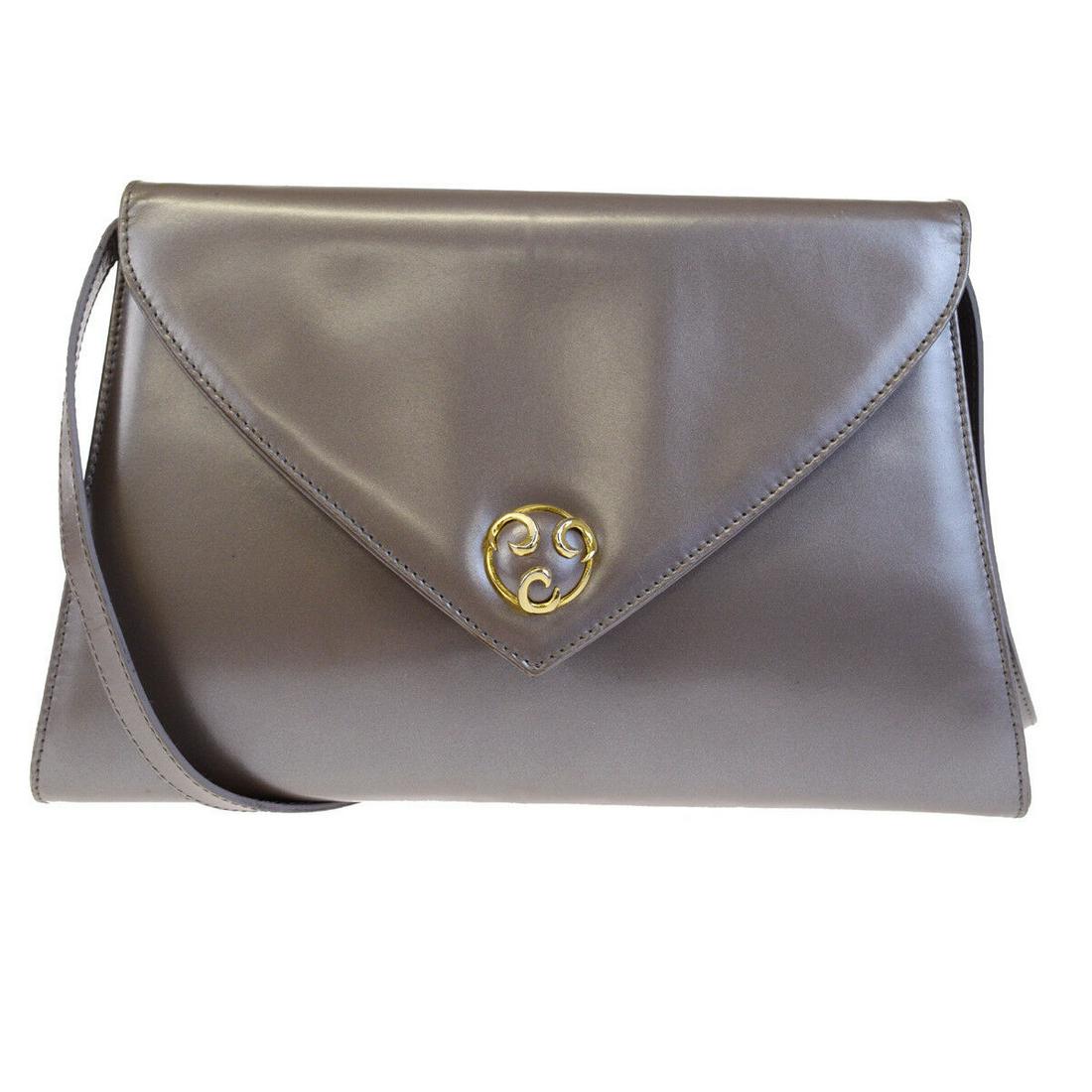 Authentic SALVATORE FERRAGAMO Leather Shoulder Bag: Brand: SALVATORE FERRAGAMO Material: Leather Style: Shoulder Bag Color: Bronze Size(inch): W 11.4 x H 7.1 x D 1.8 "(approx.) Country of Origin: Italy Come with: - All Bidhaus items come with a 100% mo