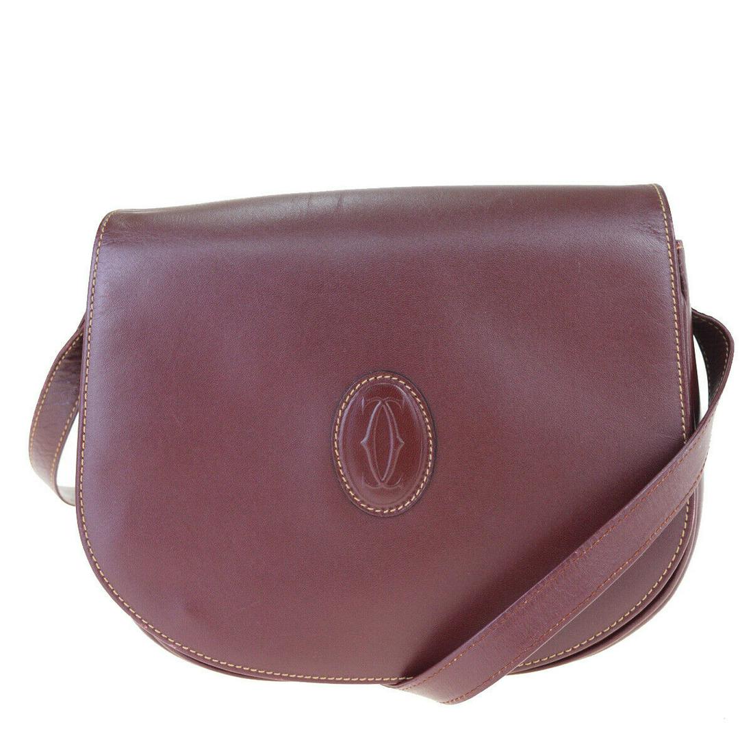 Authentic CARTIER Leather Shoulder Bag: Brand: CARTIER Material: Leather Style: Shoulder Bag Size(inch): W 9.4 x H 7.5 x D 3.1 "(approx.) Country of Origin: Italy Come with: - All Bidhaus items come with a 100% money-back authenticity guara