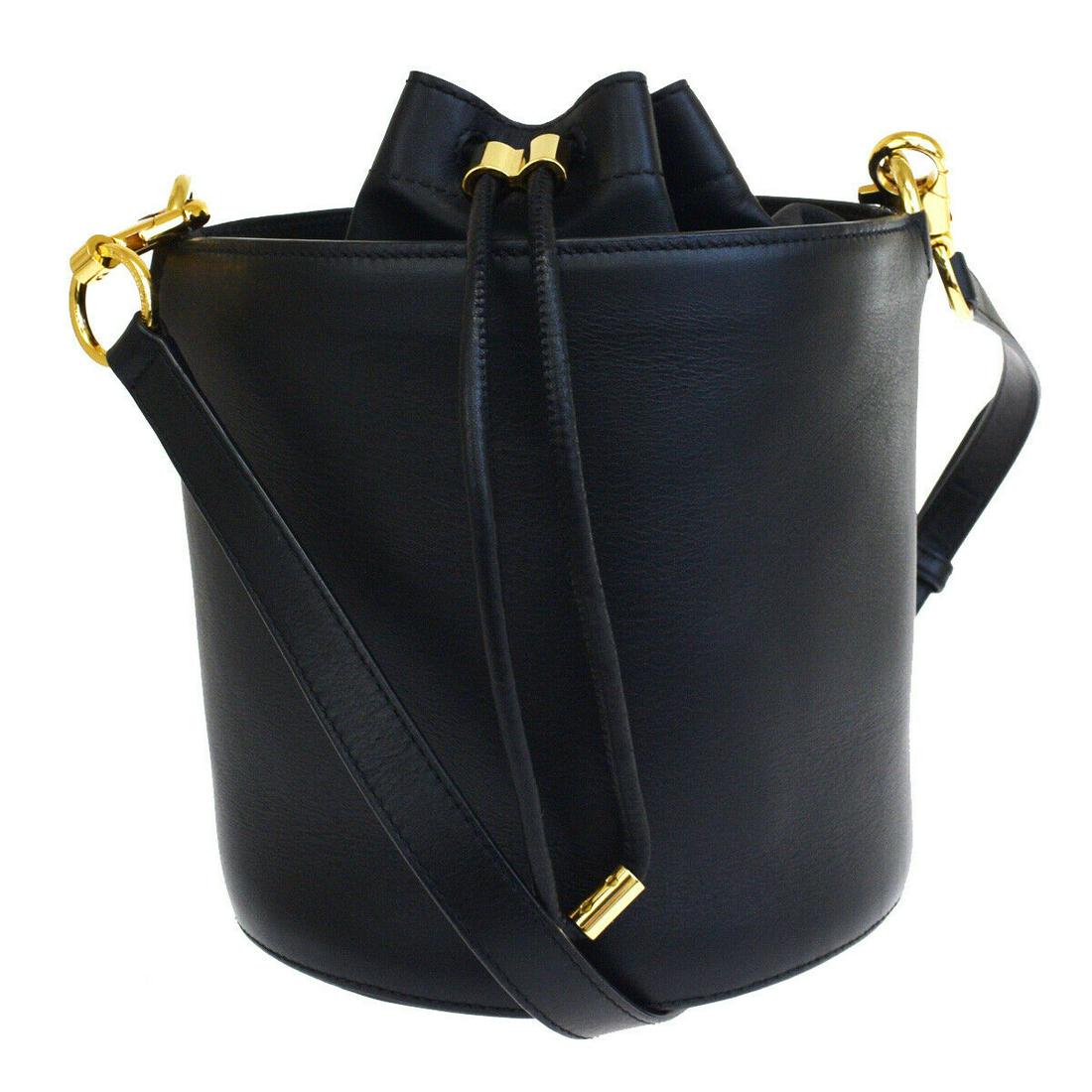 Authentic ALEXANDER WANG Leather Shoulder Bag: Brand: ALEXANDER WANG Material: Leather Style: Shoulder Bag Color: Black Size(inch): W 7.5 x H 7.1 x D 7.5 "(approx.) Country of Origin: China Come with: - All Bidhaus items come with a 100% money-bac