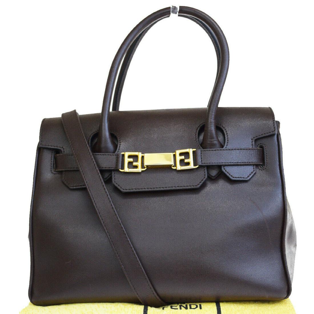 Authentic FENDI Leather Shoulder Hand Bag: Brand: FENDI Material: Leather Style: Shoulder Hand bag Color: Brown Size(inch): W 11.8 x H 8.7 x D 5.1 "(approx.) Country of Origin: Italy Come with: Dust bag All Bidhaus items come with a 100% money