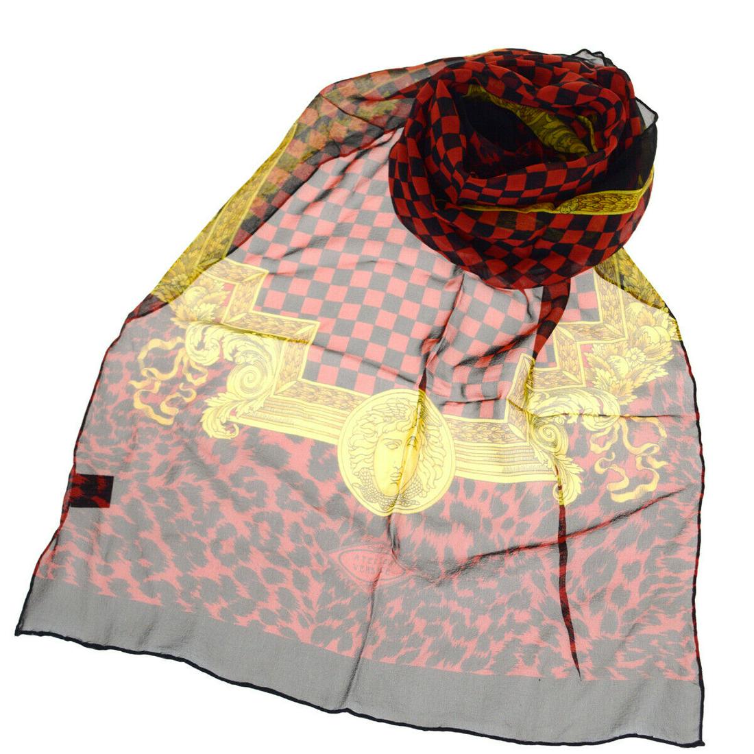 Authentic GIANNI VERSACE 100% Silk Scarf: Brand: GIANNI VERSACE Material: 100% Silk Style: Scarf Color: Red Size(inch): W 16.5 x H 65 x D 0 "(approx.) Country of Origin: Italy Come with: - All Bidhaus items come with a 100% money-back authent