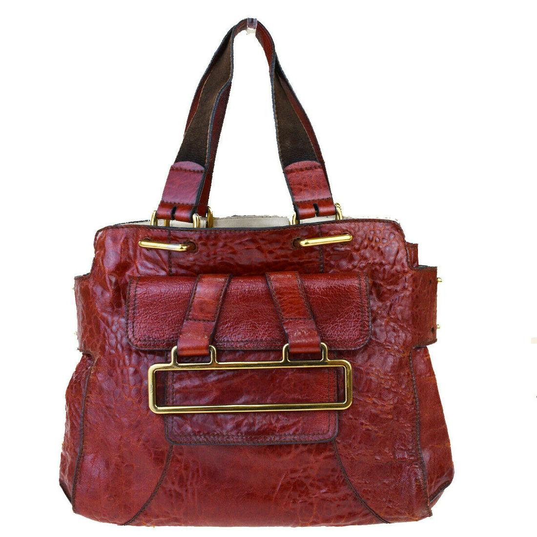 Authentic CHLOE Embossing Leather Shoulder Bag: Brand: CHLOE Material: Embossing Leather Style: Shoulder Bag Color: Red Size(inch): W 13.8 x H 11.8 x D 6.7 "(approx.) Country of Origin: Italy Come with: - All Bidhaus items come with a 100% money-ba
