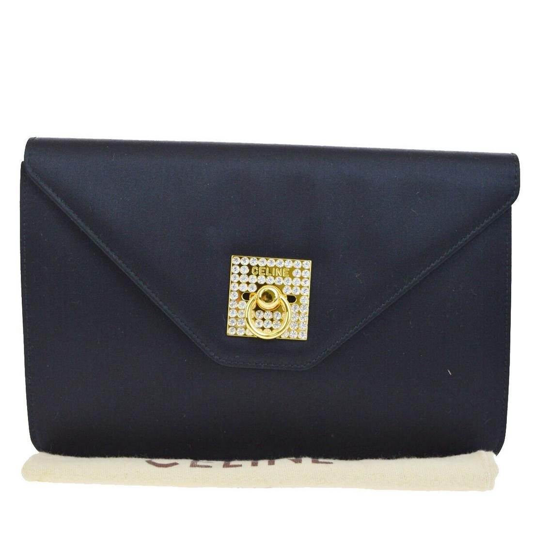 Authentic CELINE Satin Clutch Bag: Brand: CELINE Material: Satin Style: Clutch Bag Color: Black Size(inch): W 9.6 x H 6.3 x D 1.6 "(approx.) Country of Origin: Italy Come with: Tag,Dust bag All Bidhaus items come with a 100% money-back