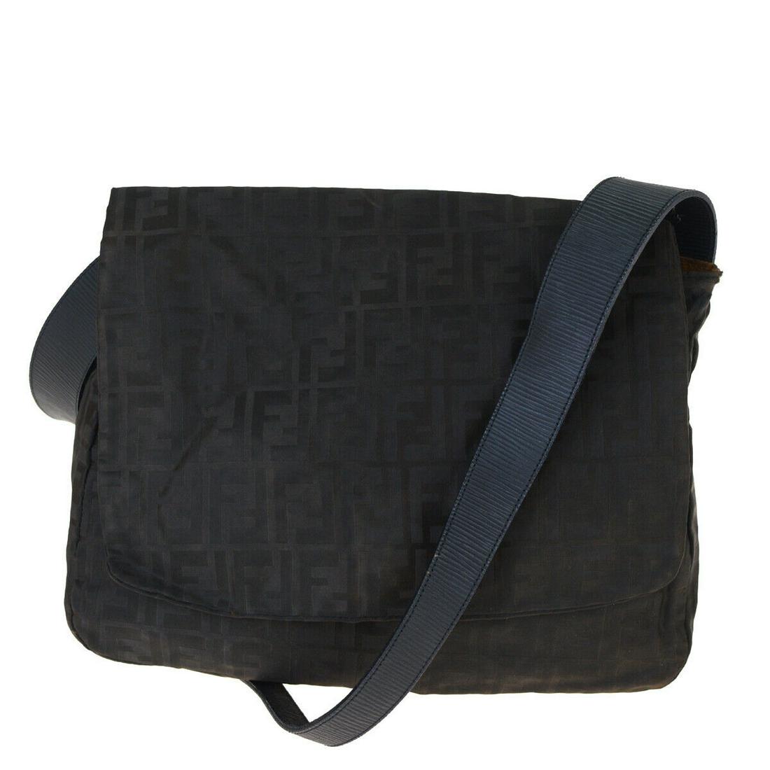 Authentic FENDI Leather, Nylon Shoulder Bag: Brand: FENDI Material: Leather, Nylon Style: Shoulder Bag Color: Brown Size(inch): W 11.8 x H 9.4 x D 3.9 "(approx.) Country of Origin: Italy Come with: - All Bidhaus items come with a 100% money-back