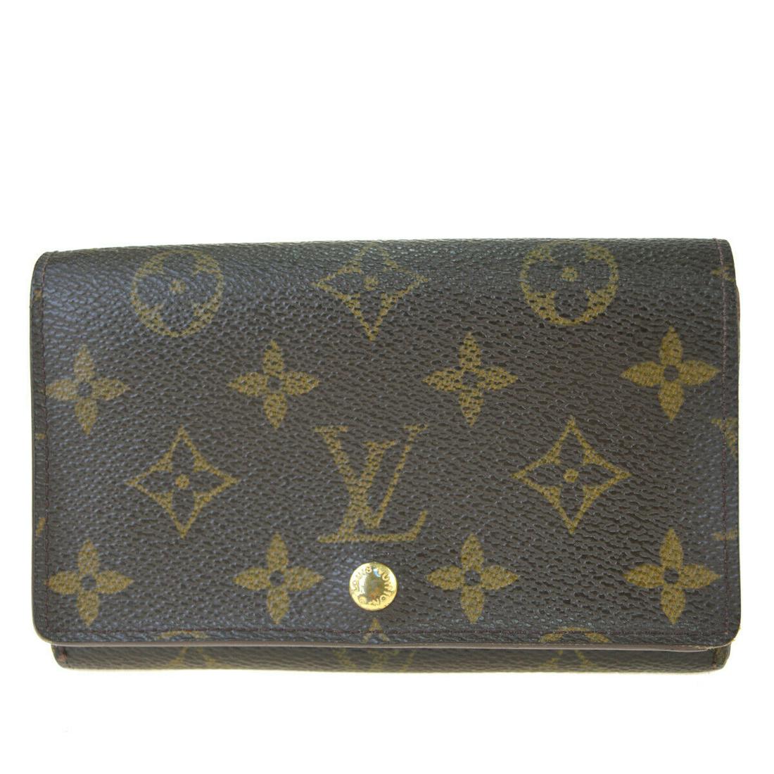 Authentic LOUIS VUITTON Monogram Leather Wallet: Brand: LOUIS VUITTON Material: Monogram Leather Style: Wallet Color: Brown Size(inch): W 5.7 x H 3.5 x D 0 "(approx.) Country of Origin: France Come with: - All Bidhaus items come with a 100% money-ba