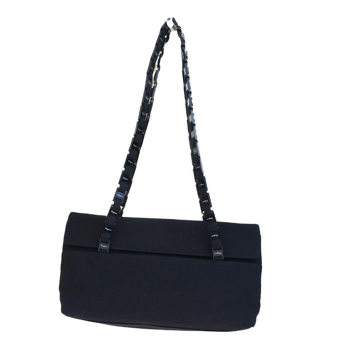 Authentic SALVATORE FERRAGAMO Nylon Shoulder bag: Brand: SALVATORE FERRAGAMO Material: Nylon Style: Shoulder bag Color: Black Size(inch): W 11.8 x H 6.3 x D 3.9"(approx.) Country of Origin: Italy Come with: - All Bidhaus items come with a 100% money-