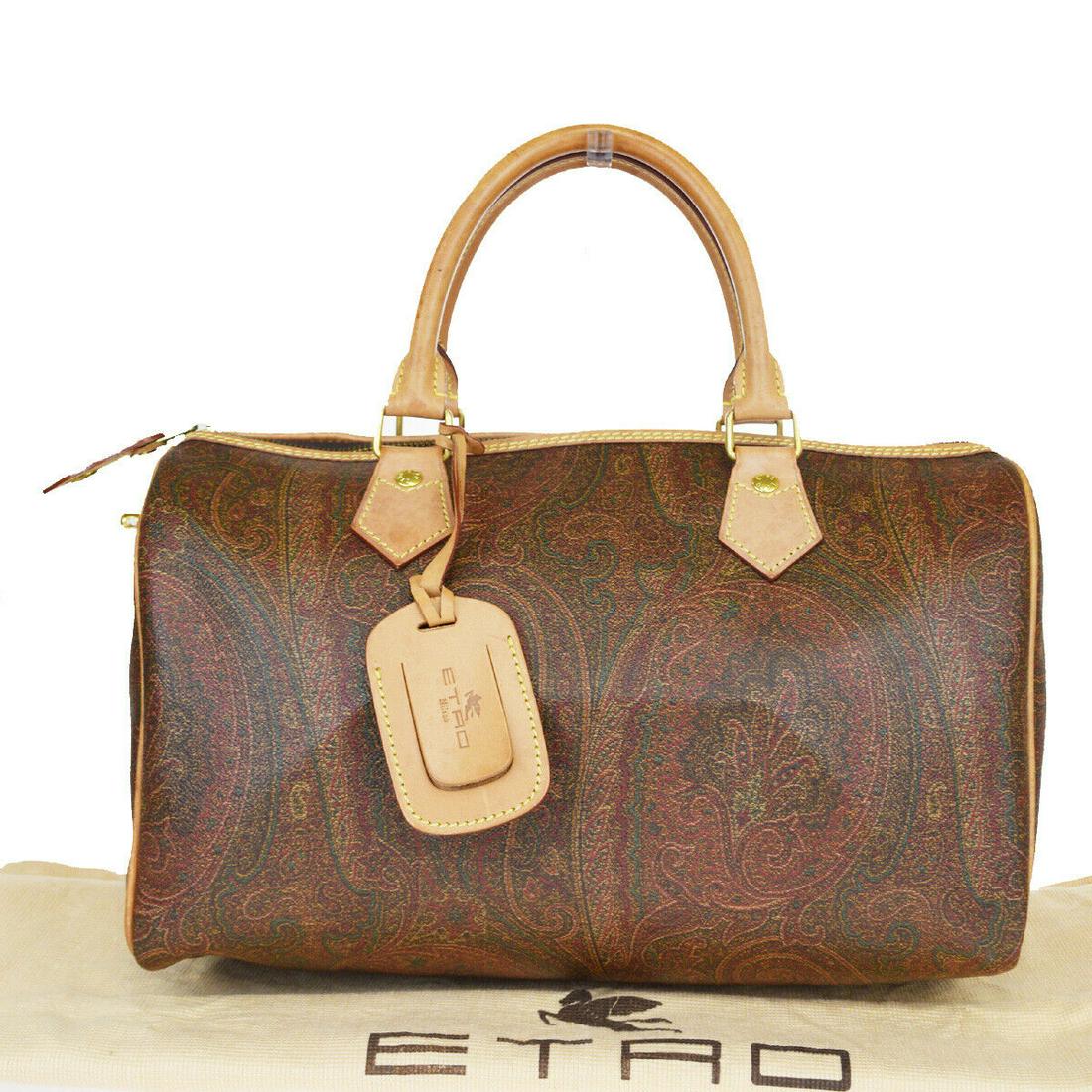 Authentic ETRO PVC Leather Hand Bag: Brand: ETRO Material: PVC Leather Style: Hand Bag Color: Bordeaux, Size(inch): W 12.6 x H 7.5 x D 7.1 "(approx.) Country of Origin: Italy Come with: Name tag,Dust bag All Bidhaus items come with a 100