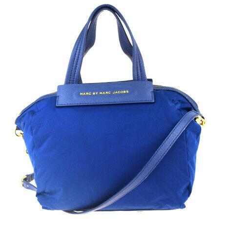 Authentic MARC BY MARC JACOBS Nylon, Leather Shoulder: Brand: MARC BY MARC JACOBS Material: Nylon, Leather Style: Shoulder bag Color: Blue Size (HxWxD): 29cm x 30cm x 11cm / 11.41'' x 11.81'' x 4.33'' Country of Origin: China All Bidhaus items come with a