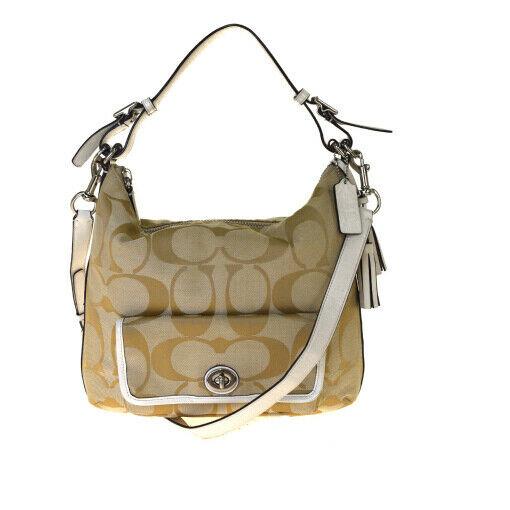 Authentic COACH Canvas, Leather Shoulder bag: Brand: COACH Material: Canvas, Leather Style: Shoulder bag Color: Beige Size (HxWxD): 29cm x 33.5cm x 5cm / 11.41'' x 13.18'' x 1.96'' Country of Origin: Vietnam All Bidhaus items come with a 100% mon