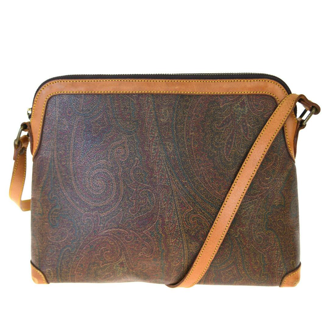 Authentic ETRO PVC Messenger bag: Brand: ETRO Material: PVC Style: Messenger bag Color: Brown Size (HxWxD): 21cm x 27cm x 7cm / 8.26'' x 10.62'' x 2.75'' Country of Origin: Unknown All Bidhaus items come with a 100% money-back authent