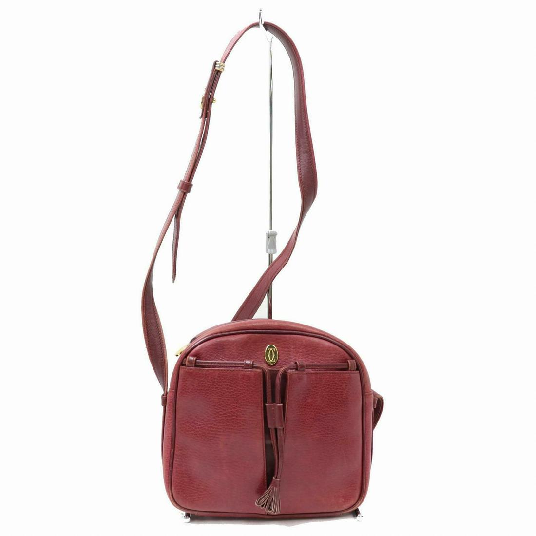 Authentic CARTIER Leather Shoulder Bag: Brand: CARTIER Material: Leather Style: Shoulder Bag Color: Bordeaux Size(inch): W7.48 inch(approx) /19 cm(approx) x H7.08 inch(approx) /18 cm(approx) x D1.96 inch(approx) /5 cm(approx) " / Strap Drop