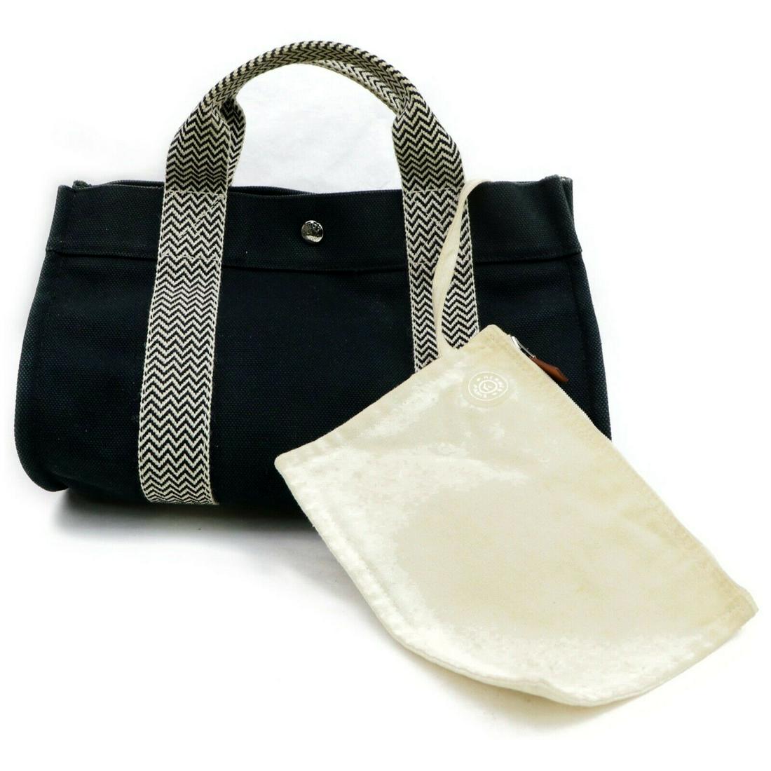 Authentic HERMES Canvas Tote Bag: Brand: HERMES Material: Canvas Style: Tote Bag Color: Black Size(inch): W13.3 inch(approx) /34 cm(approx) x H7.87 inch(approx) /20 cm(approx) x D8.66 inch(approx) /22 cm(approx) " Country of Origin: F