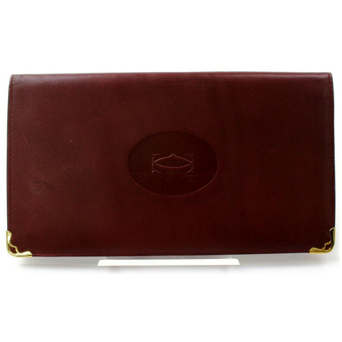 Authentic CARTIER Leather Long Wallet: Brand: CARTIER Material: Leather Style: Long Wallet Color: Bordeaux Size(inch): W4.13 inch(approx) /10.5 cm(approx) x H7.48 inch(approx) /19 cm(approx) x D0.39 inch(approx) /1 cm(approx) " Country of 