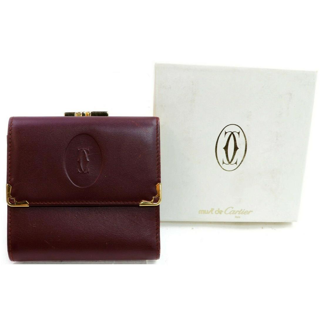 Authentic CARTIER Leather Wallet: Brand: CARTIER Material: Leather Style: Wallet Color: Bordeaux Size(inch): W3.93 inch(approx) /10 cm(approx) x H3.74 inch(approx) /9.5 cm(approx) x D0.78 inch(approx) /2 cm(approx) " Country of Origin