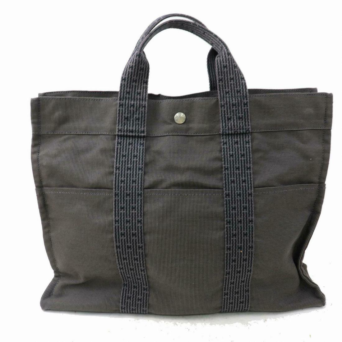 Authentic HERMES Nylon Tote Bag: Brand: HERMES Material: Nylon Style: Tote Bag Color: Grays Size(inch): W16.5 inch(approx) /42 cm(approx) x H12.2 inch(approx) /31 cm(approx) x D4.33 inch(approx) /11 cm(approx) " Country of Origin: Fr