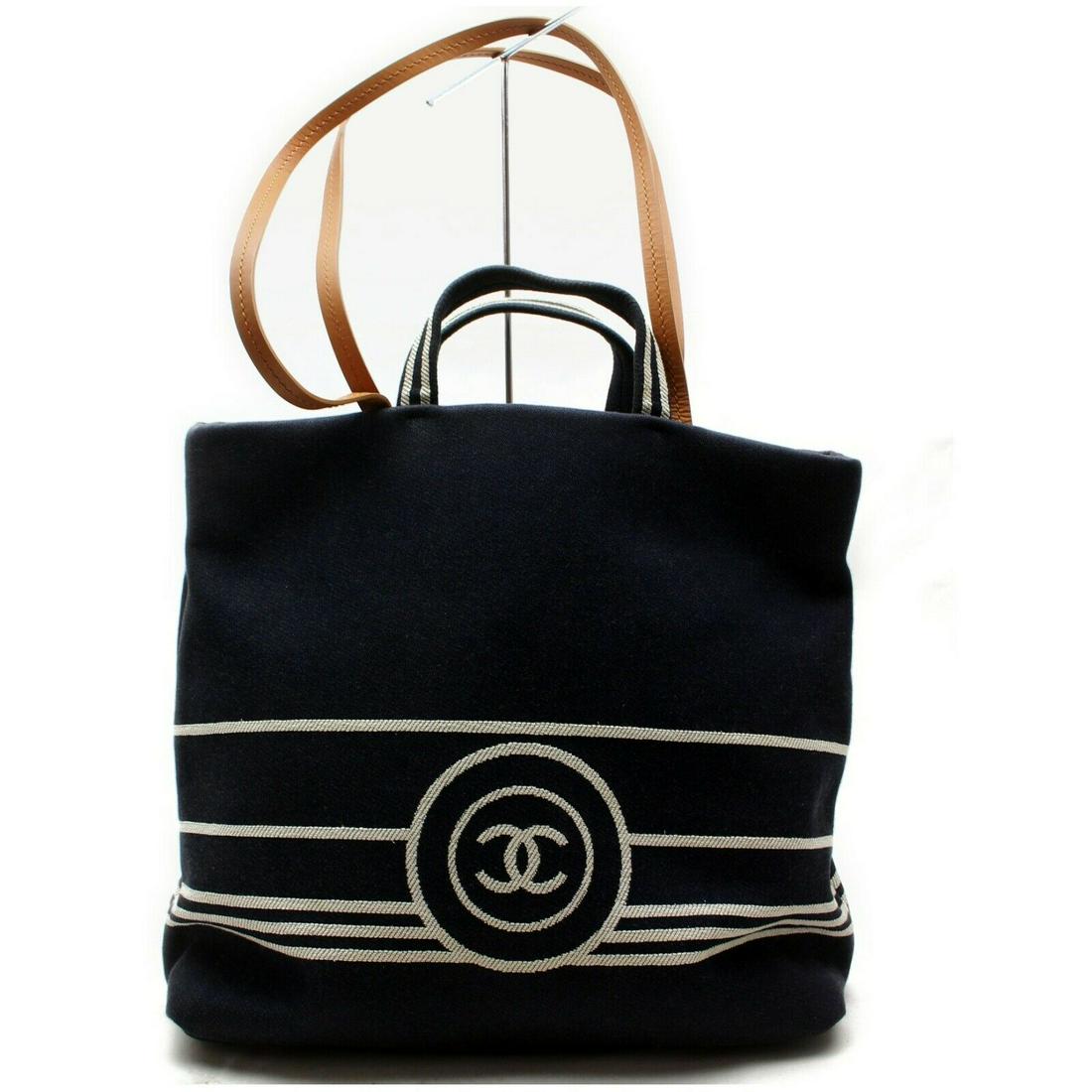 Authentic CHANEL Denim Tote Bag: Brand: CHANEL Material: Denim Style: Tote Bag Color: Navy Blue Size(inch): W13.7 inch(approx) /35 cm(approx) x H13.7 inch(approx) /35 cm(approx) x D5.90 inch(approx) /15 cm(approx) " / Strap Drop: Sho
