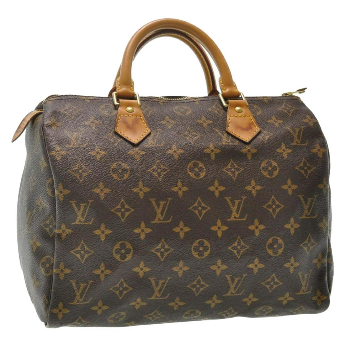Authentic Louis Vuitton Monogram Speedy 30 Hand Bag: Brand: Louis Vuitton Style: Hand Bag Material: Monogram Canvas Color: Monogram Made In: France Size (Inches): W12 X H9 X D6.5"(Approx) Exterior Condition: Monogram Canvas : minor Rubbing, Loose Shape,