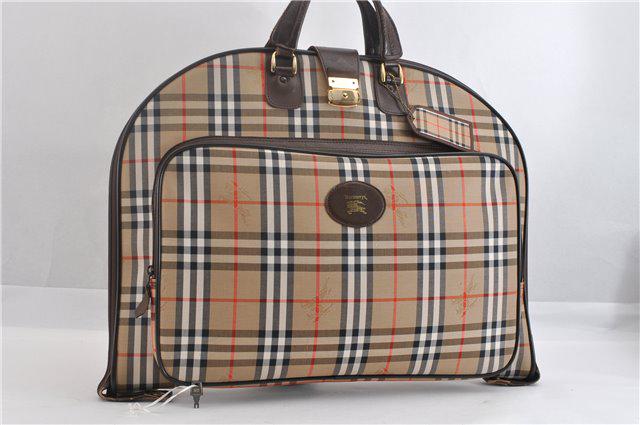 Authentic BURBERRY Canvas Garment Cover: Brand: BURBERRY Material: Canvas Style: Garment Cover Color: Beige Size(inch): W22 x H16.9 x D1.6" / Handle Drop 2.8"(Approx) Country of Origin: - Accessory: key,Hangers All Bidhaus items come with a
