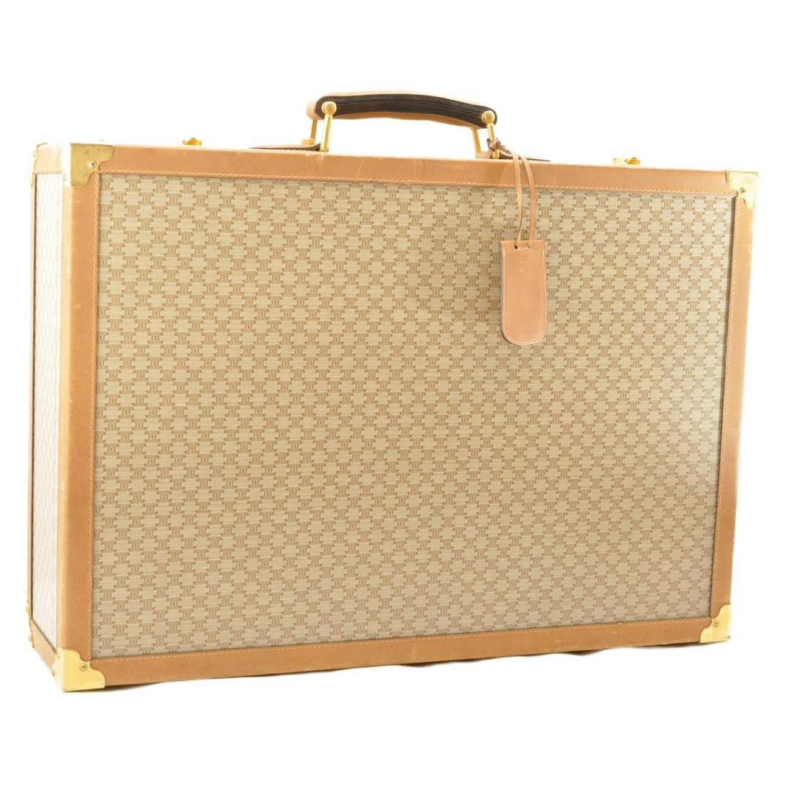 Authentic CELINE PVC Leather Trunk Case: Brand: CELINE Material: PVC Leather Style: Trunk Case Color: Beige Size(inch): W22.04 x H15.35 x D5.9inch(Approx) Country of Origin: â€“ Accessory: Name Tag / Key No(000) All Bidhaus items come w