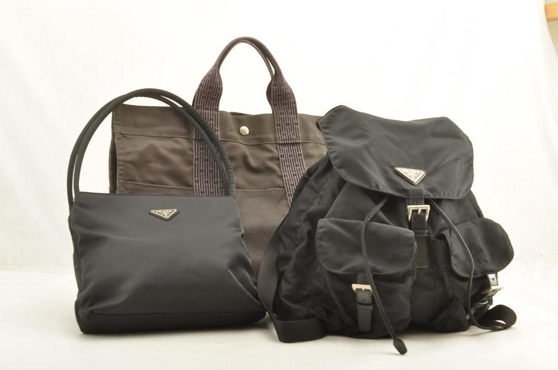 Authentic HERMES / PRADA Nylon Hand Bag / Backpack /: Brand: HERMES / PRADA Material: Nylon Style: Hand Bag / Backpack / Shoulder Bag Color: Gray / Black Size(inch): â€“ Country of Origin: â€“ Accessory: There is no item box and dust bag. We wi
