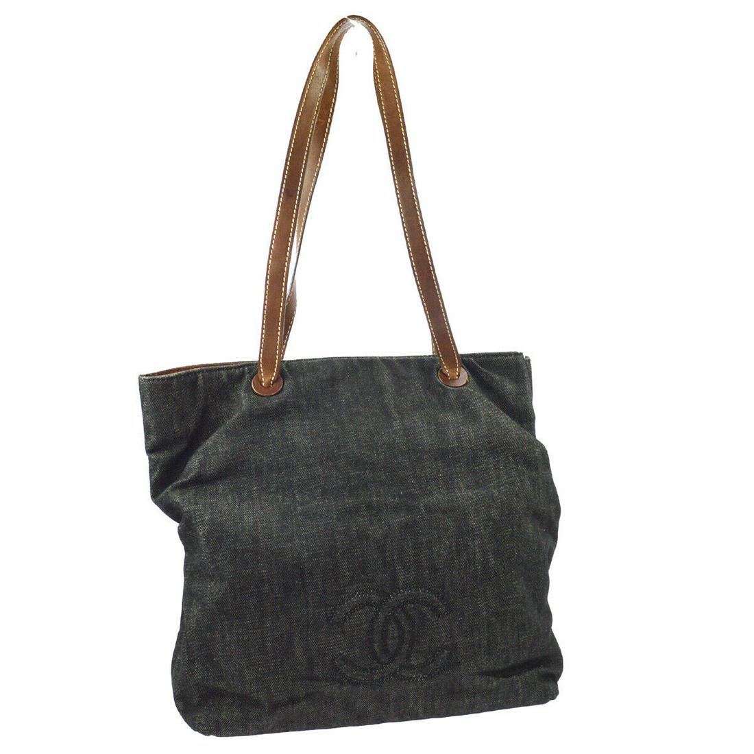 Authentic CHANEL Denim, Leather Totes & Shoppers: Brand: CHANEL Material: Denim, Leather Style: Totes & Shoppers Color: Black, Brown Size(inch): W12.2 x H13.0 x D3.9 " / Strap Drop: 11.8 Country of Manufacture: Italy Come with: Authenticity Seal All 