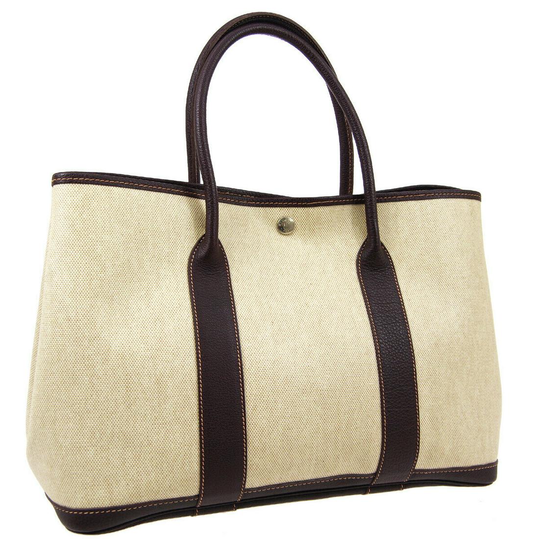 Authentic HERMES Toile H, Leather Tote: Brand: HERMES Material: Toile H, Leather Style: Tote Color: Beige, Dark Brown Size(inch): W14.2 x H9.8 x D6.7 " / Strap Drop: 5.5 Size(inch): W 14.2 x H 9.8 x D 6.7 " Handle Drop. 5.5 " Country of Ori