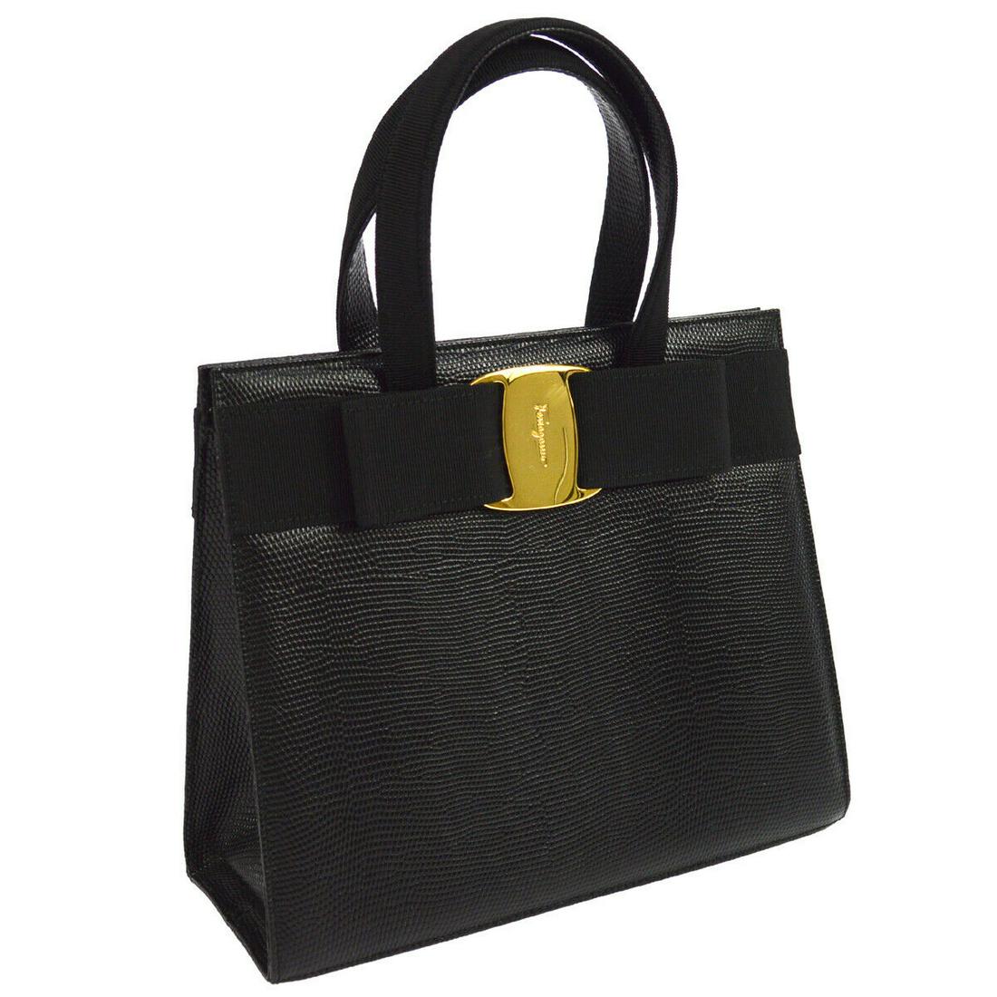 Authentic SALVATORE FERRAGAMO Embossed Lizard Leather: Brand: SALVATORE FERRAGAMO Material: Embossed Lizard Leather Style: Hand Bag Color: Black Size(inch): W9.6 x H8.5 x D3.9 " / Strap Drop: 3.5 or 18.9 Country of Manufacture: Italy Come with: Shoulder S